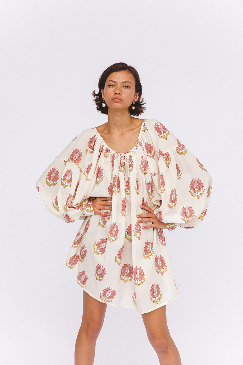 Ria Mini Dress Strawberry Cream — studio full length front view, model wearing strawberry cream floral hand block print cotton mini dress, A-line silhouette with gathered bust and short puff sleeves, artisan Jaipur India | Daughters of India